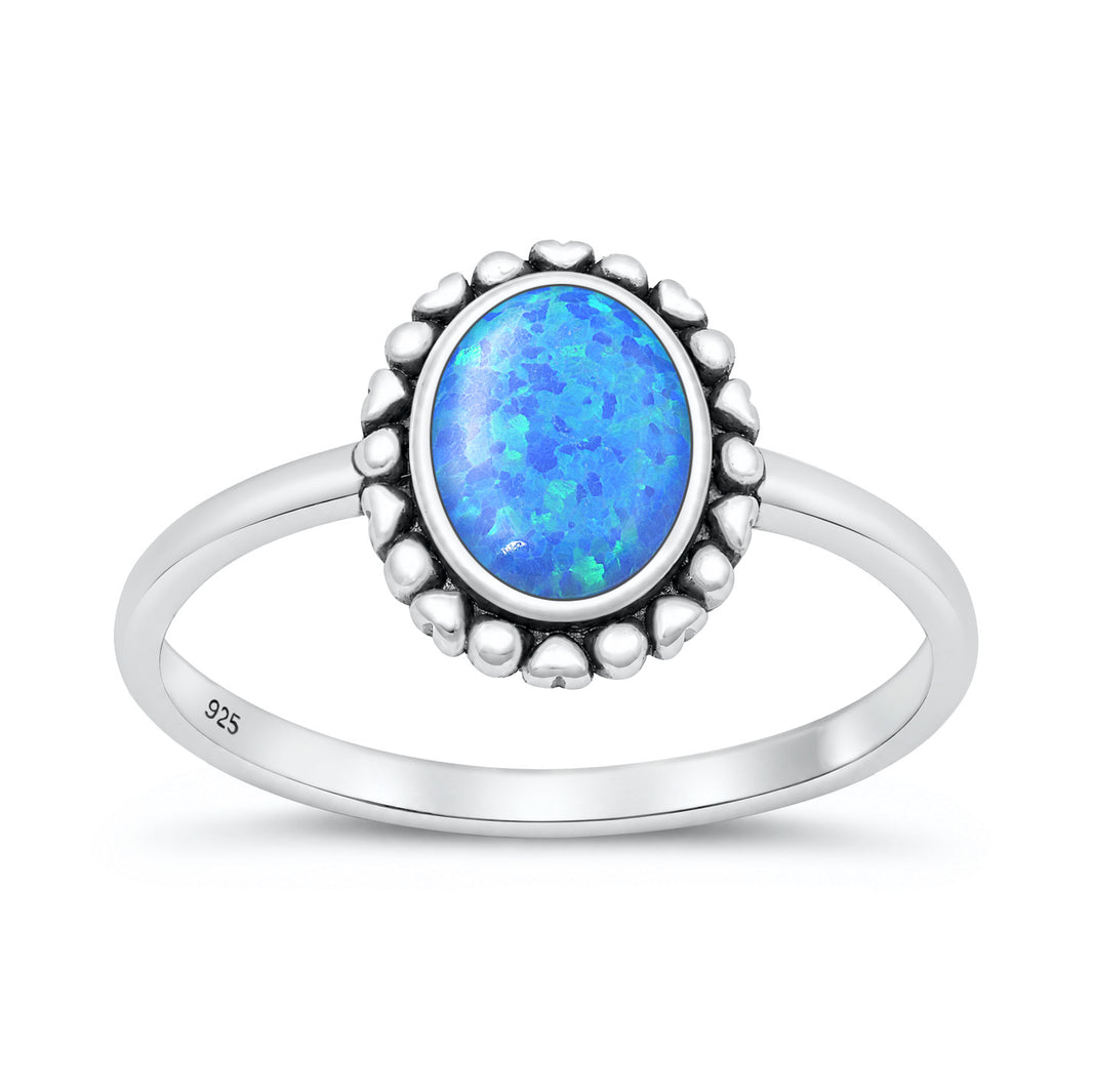Silver Oval Stone Ring with Heart Border
